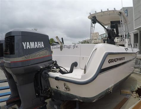 Seaport blue full hull color, custom white yamaha motor upgrade, factory painted (powdercoated) hardtop w/ matching. 1997 Used Grady-White 272 Sailfish Center Console Fishing ...