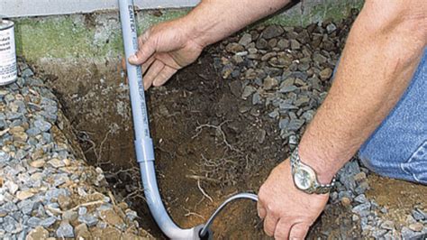 Running Pvc Conduit Underground Using Cleaner And Pvc Cement As Needed