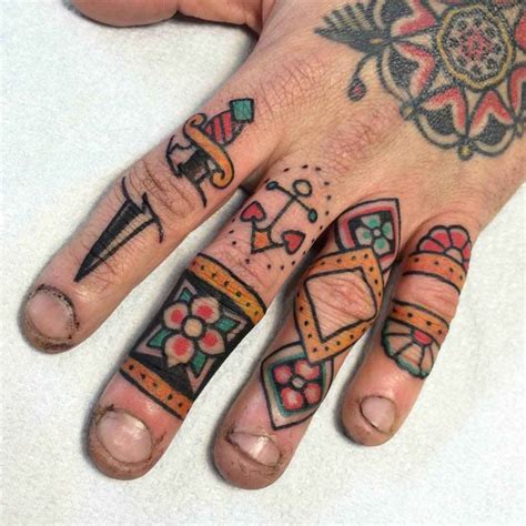 Finger tattoos,finger tattoo,finger tattoos for women,finger tattoo ideas,minimalist finger tattoos,girls finger tattoos,woman finger tattoos,simple finger tattoo,tattoo on finger,pretty finger tattoos,women finger tattoos,finger tattoo pictures,feminine finger tattoos,dainty finger tattoos,pretty finger,feminine finger tattoo,tattoos for fingers,tattoos on your finger,fingertattoo,beautiful. Traditional Tattoos on Fingers | Best Tattoo Ideas Gallery