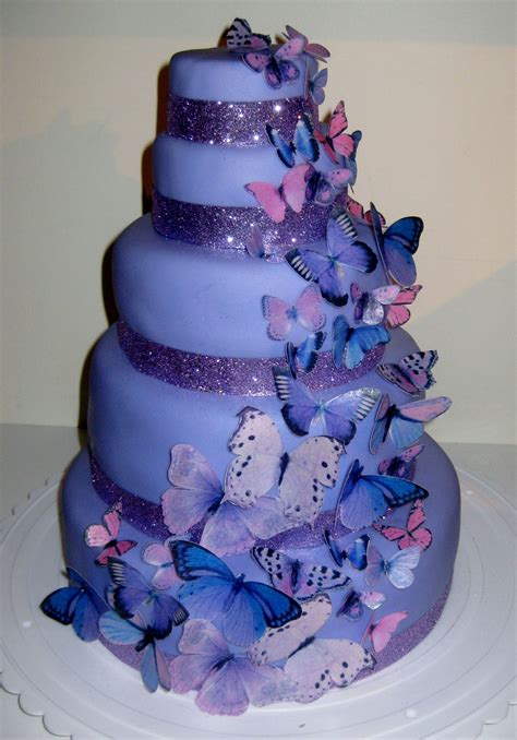 Purple Butterfly Cake But Instead Ivory Icing And Flowers Instead Of Bling Around Cake Bottoms