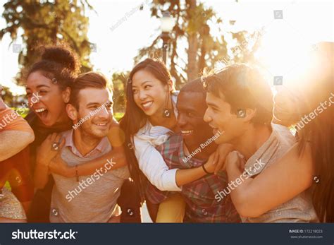 Group Of Friends Having Fun Together Outdoors Stock Photo 172218023