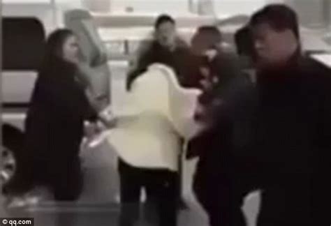 Scorned Wife In China Beats Husband After Catching Him Cheating With