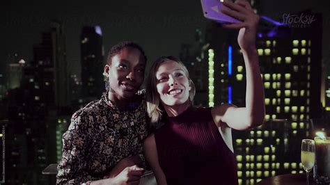 Girlfriends Having Fun And Taking A Selfie By Jovo Jovanovic Stocksy
