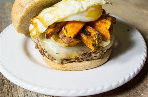 Quinoa Veggie Burger With Sweet Potato Fries Egg Lemons And Basil