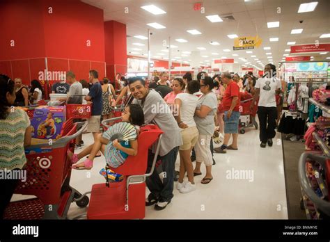 Shoppers on the check-out line at the new Target store in the East