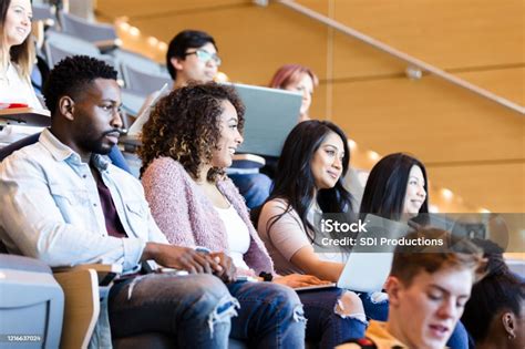 Multiethnic College Students Are Seated And Ready For Class Stock Photo