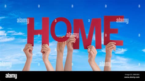 People Hands Holding Word Home Blue Sky Stock Photo Alamy
