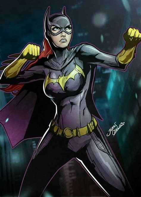 A Woman Dressed As Batgirl Standing In Front Of A Cityscape With Her
