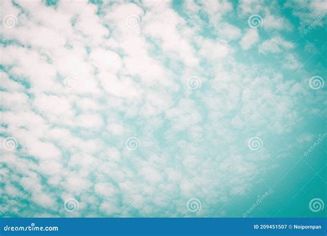 Blurred Sky Background With Natural Scattered Clouds On Wind Movement