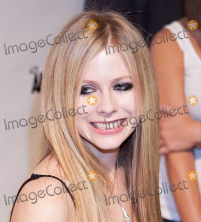 Photos And Pictures Avril Lavigne Wears A Black Tutu Dress Ripped