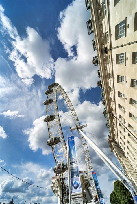 The London Eye Observation Wheel On A Busy Summer Afternoon Editorial