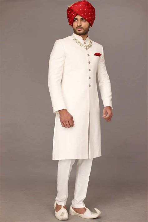 (pc fabric) classy look short length sherwani features rich quality embroidery and embellishments accentuates the front. Groom wedding sherwani designs for barat 18 - FashionEven