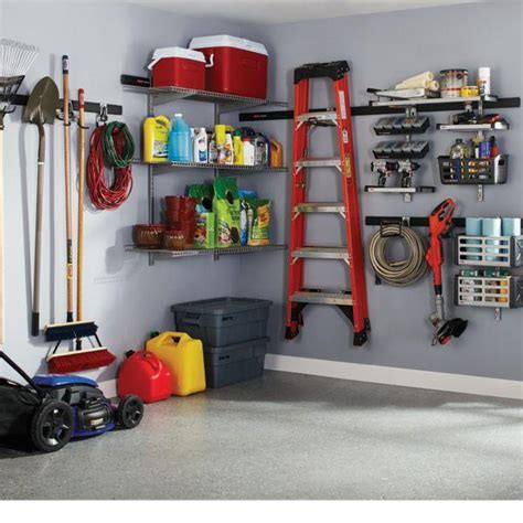 This garage features various storage solutions. Amazon.com - Rubbermaid FastTrack Garage Storage System ...