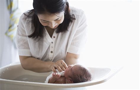 You could add a little bath emollient to the water. How to safely bathe your newborn: Simple steps for baby's ...