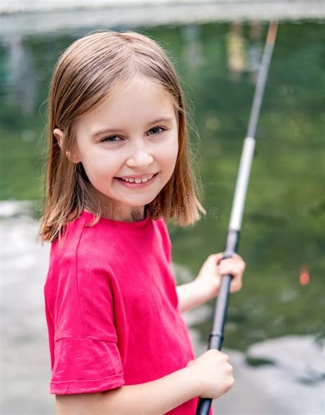 258 Little Girl Playing Outdoors Fishing Stock Photos Free And Royalty