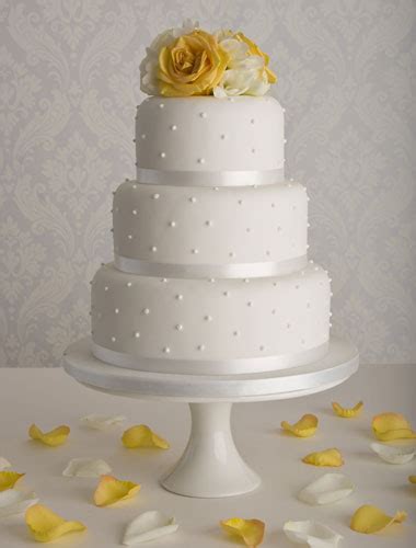 You can draw inspiration from this cake design that has a cupid's arrow striking the two engagement rings which makes it a perfect announcement delight which you and your guests can enjoy. Affordable wedding cakes - Simple wedding cakes by Maisie ...