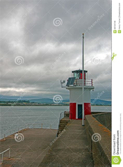Wicklow Ireland Harbor Jetty Breakwater Wall And Lighthouse Stock