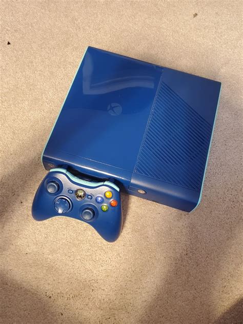 Limited Edition Blue Xbox 360 Comes An Assortment Of Video Games In