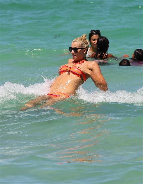 Lena Gercke Showing Off Her Hot Body In Skimpy Multicolored Bikini At The Beach Porn Pictures