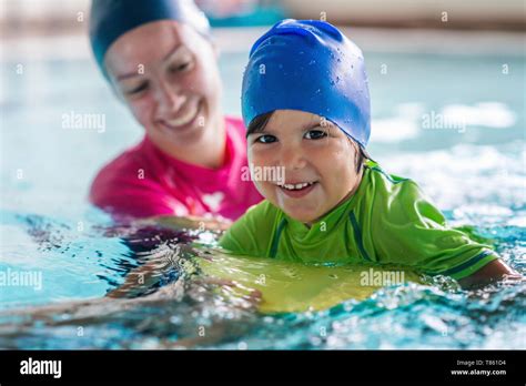 Little Boy Learning To Swim Stock Photo Alamy