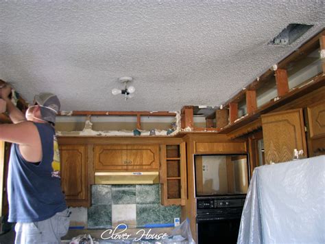 Next, you'll want to remove the cabinets. Clover House: Kitchen Cabinet Makeover - Part 1
