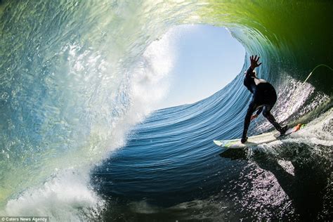 Leroy Bellet Captures Photos Of Surfers Riding Waves From Inside The
