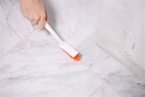 To clean grout lines and make the tiles sparkle, make a paste using hydrogen peroxide, dish soap, and baking soda. How to Clean Grout in 5 Easy Steps | Rent-A-Center