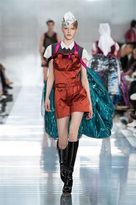 For the designer's spring/summer 2020 show, leon dame closed the show wearing a black belted jacket, cadet hat and knee boots. MAISON MARGIELA SPRING SUMMER 2020 COLLECTION | The Skinny ...