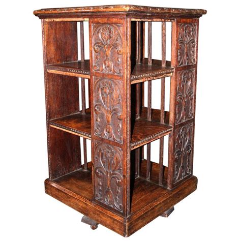 It is a four sided open bookcase that can house a selection of books on each side and rotates 360 degrees to gain access to them on a central stand. Carved Oak Revolving Book Stand | Vintage bookcase, Blue ...