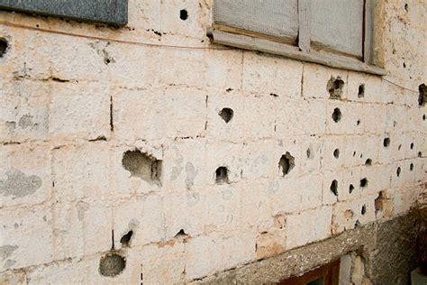 Best Bullet Hole Wall Stock Photos Pictures And Royalty Free Images Istock