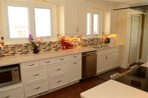 We remodel, rebuild and design custom kitchens and bathrooms with custom cabinetry, counter tops, sinks, vanities, fixtures and much more. White Kitchens- So prestine yet so stylish!! - Kitchen ...