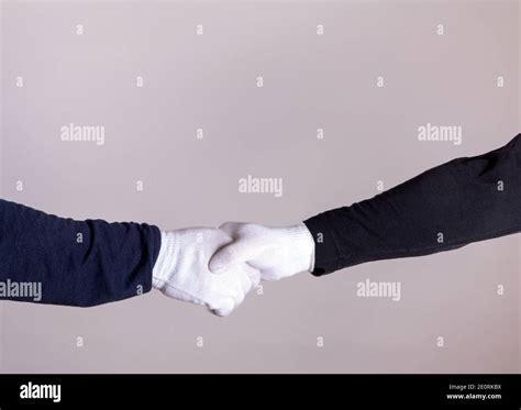 Handshake With White Gloves Stock Photo Alamy