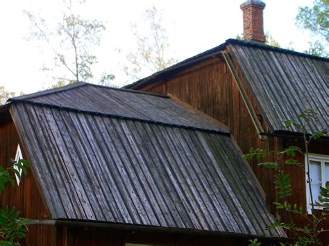 There are a surprising few types of roofs for the home. Roofing of tarred planks. Seurasaari open air museum, Helsinki. | Wood roof, House styles, Roof