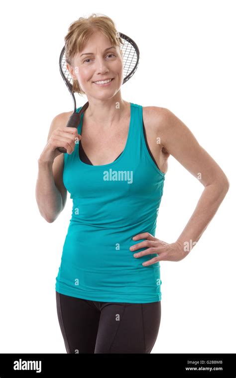 Fitness Model Holding A Tennis Racquet In Her Hands Isolated On White