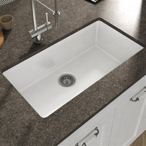 Undermount kitchen sinks are positioned below the surface of the countertop so that the edge of the counter drops directly into the sink. Empire Industries Yorkshire Undermount Fireclay 31.5 in ...