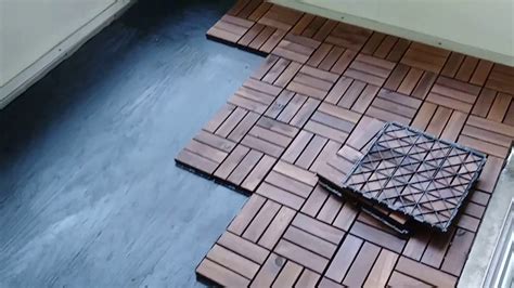 These outdoor flooring tiles are a great option to continue the look of wooden furniture or railings. How I Installed Our Porch Flooring, IKEA RUNNEN Tiles ...