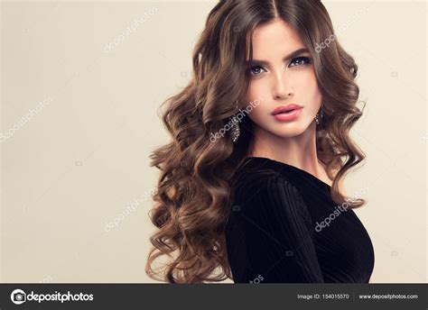 Beautiful Model Girl With Curly Hair Stock Photo By ©edwardderule 154015570
