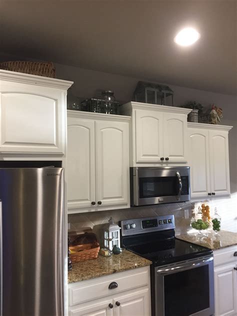 Make sure you spray in light, even coats and purchase enough paint for the job. Finished repainting cabinets. Added a few new farmhouse ...