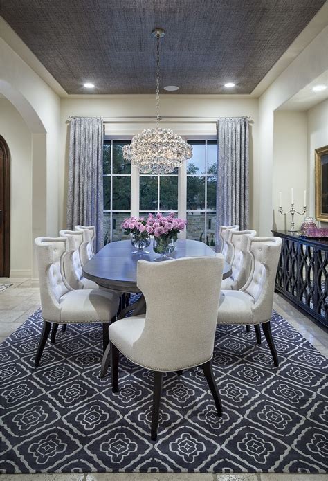 Cream Colored Dining Room With Grey Rug Curtains And Ceiling Dining
