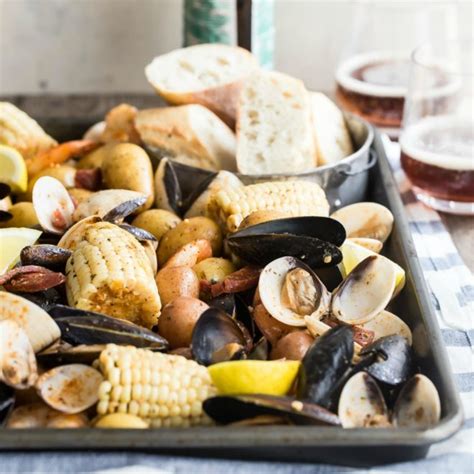 I let them soak in cold water for around twenty minutes in a strainer with a bowl underneath so i can see any sand that comes out when i drain them. Sheet Pan Clam Bake Recipe | Culinary Hill