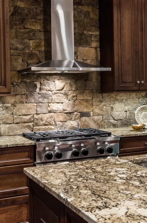 Stacked stone backsplash for kitchen appliance. 9-Marvelous-Stacked-Stone-Backsplash-with-Silver-Stove ...