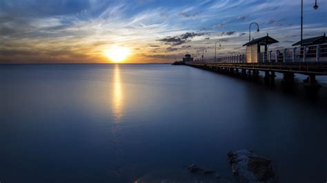 1920x1080 Sunset Clouds Sea Pier Coolwallpapersme