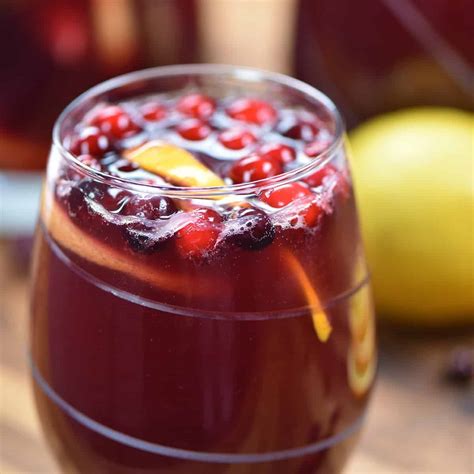 These 12 christmas drink recipes are easy to make & are sure to spread holiday cheer! Holiday Sangria | Easy Christmas Cocktail Recipes