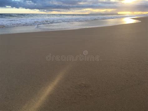 Pacific Ocean Waves At Beach In Kekaha During Sunset On Kauai Island