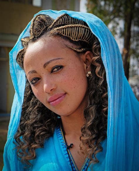 Young Ethiopian Woman Wearing Traditional Dress And Hairstyle