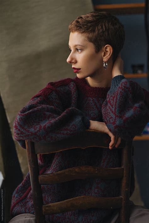 Portrait Of A Short Haired Girl Sitting On A Chair By Stocksy Contributor Ivan Ozerov Stocksy