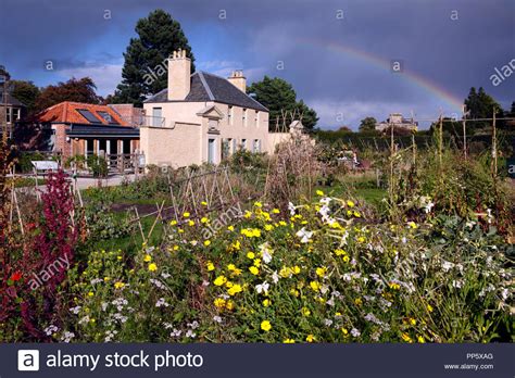 The Botanic Cottage With Rainbow At The Royal Botanic Garden In