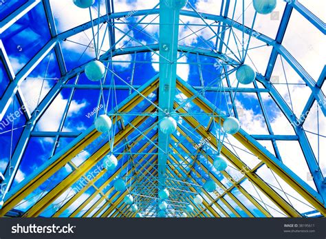 Abstract Blue Geometric Ceiling In Office Center Stock