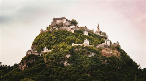 A Beautiful Castle Built On Top Of A Mountain Rwallpaperspro