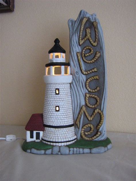 Cast iron home decor collectibles nautical house warming gift of anchor wall shelf brackets, anchor wall hooks, lighthouse coat wall rack bundle 5.0 out of 5 stars 1 $59.98 $ 59. Ceramic Lighthouse | Etsy | Ceramics, Lighthouse, Pottery